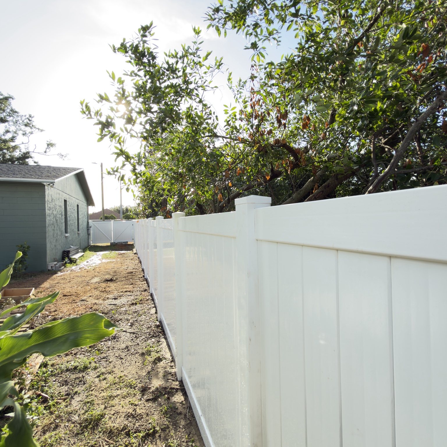 Completed white PVC vinyl fence
